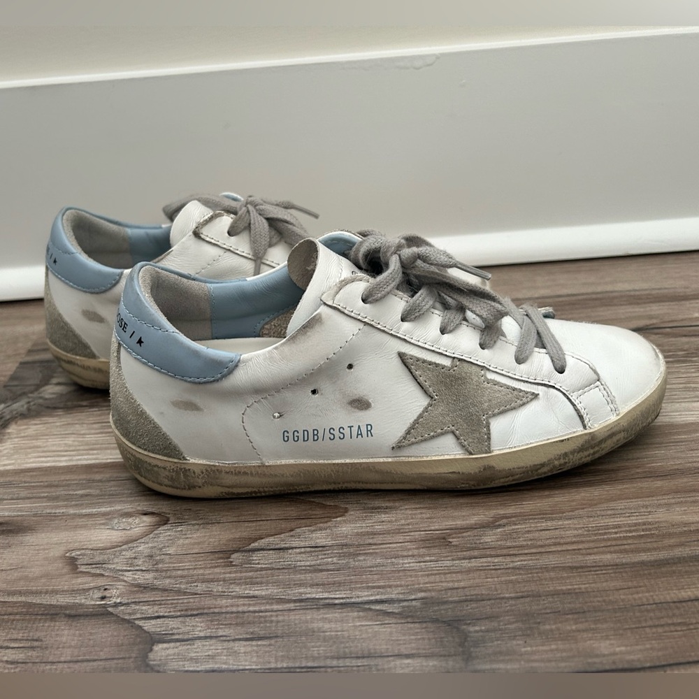 Golden Goose Women’s Superstar with light blue trim and suede star